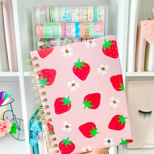Cute girls school notebook with printed strawberries and flowers