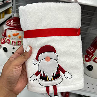 Towel with adorable Santa embroidered on it