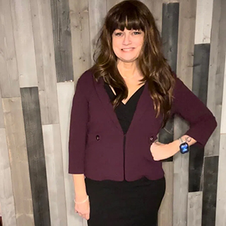 Great quality and stylish woman's fall outfit, a burgundy jacket, and a fitted black dress from a Ross store