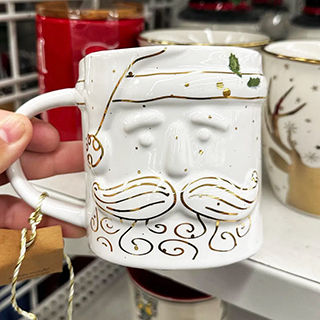 An image displaying a cute white glazed Santa Claus Christmas mug from a Ross store