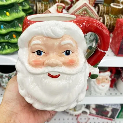 An image displaying an adorable red and white glazed Santa Clause Christmas mug from a Ross store