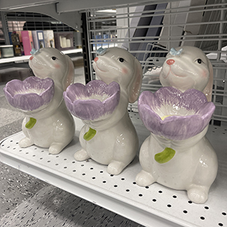 Affordable ceramic bunnies holding a lavender flower bowl from Ross