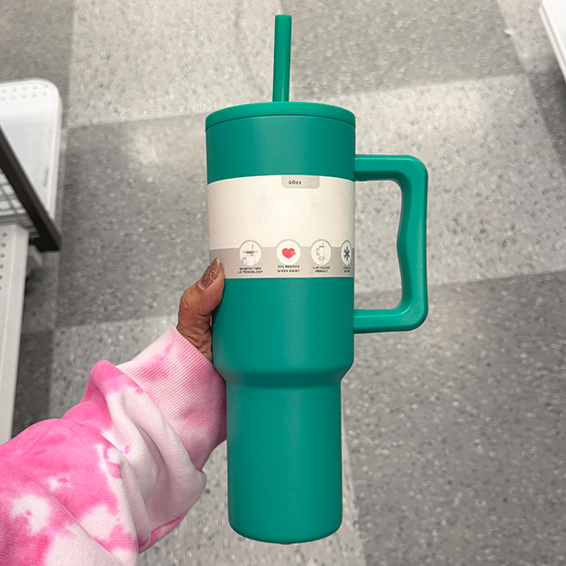 Teal insulated tumbler with handle and straw, found in store at Ross.